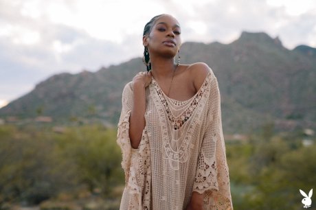 Beautiful ebony babe Nyla shows her juicy melons in a sexy outdoor striptease