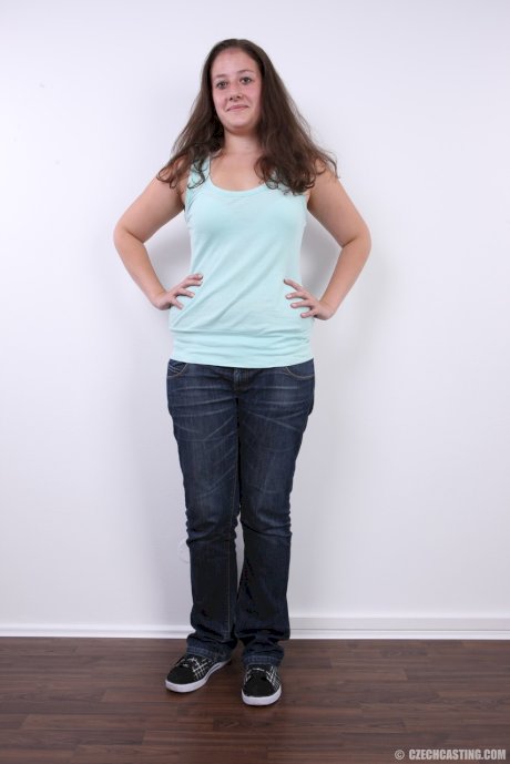 Plump girl Klara stands fully clothed before making her totally nude debut
