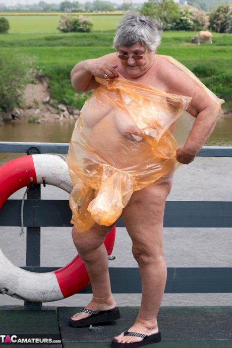 Obese British amateur Grandma Libby casts off a see-through raincoat