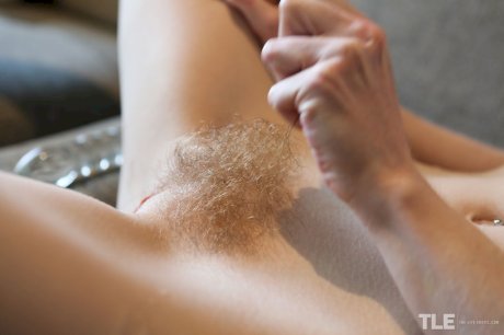 Nerdy teen Layla Cherrie pees in the shower before dildoing her trimmed muff