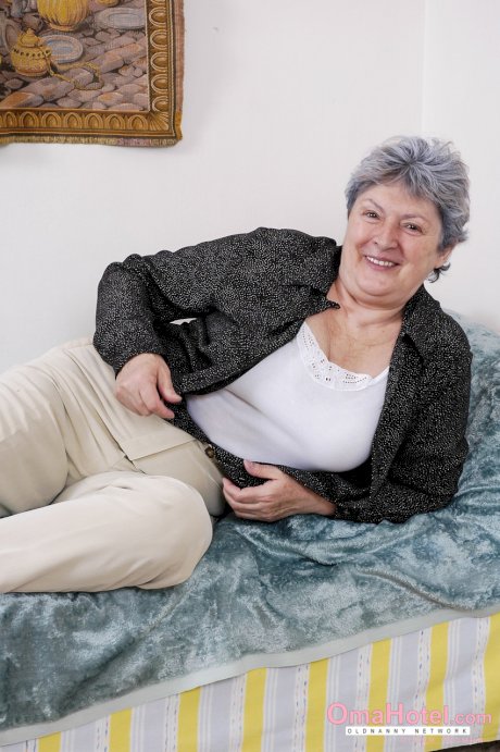 Chubby grey-haired granny Othilia toys her horny hairy pussy with a dildo