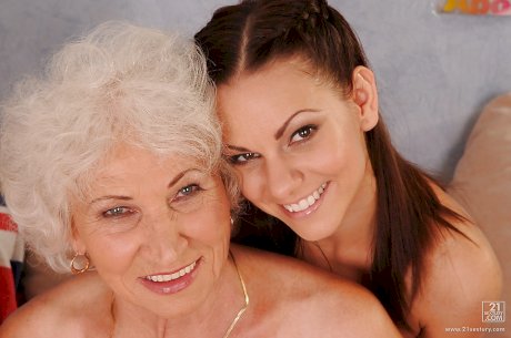 Dirty-minded teenage lesbians perform foursome posing scene with lewd grannies