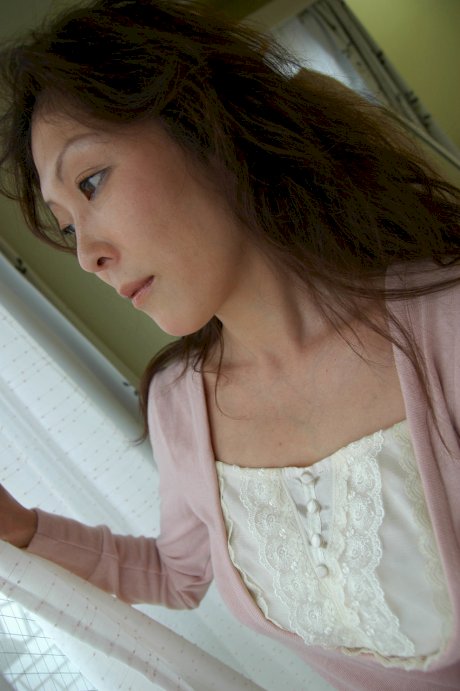 Brunette Asian granny Masako Suzuki reveals her big juggs and nice ass