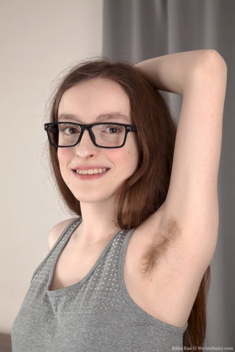 Nerdy girl Billie Rae proudly shows her hairy pits and pussy in glasses