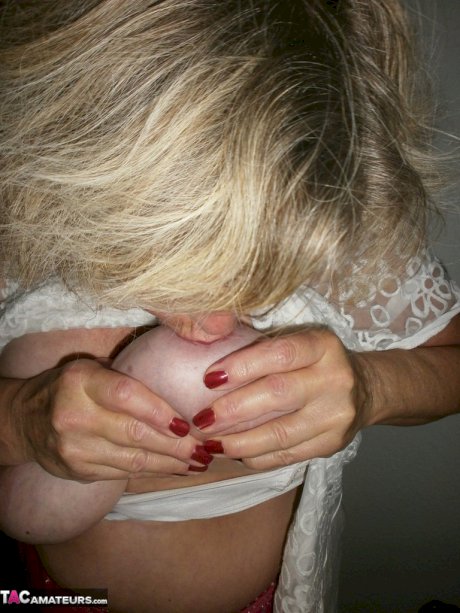 Kinky amateur mature woman Caro reveals and pleases her wolf hairy twat