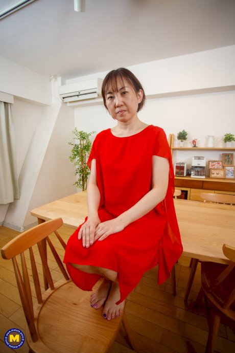 Japanese mom Yuki Kozakura posing in her red dress and panties in a solo