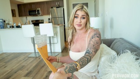 Blonde MILF with tattoos Lolly Dames exposes her curves and gets fucked