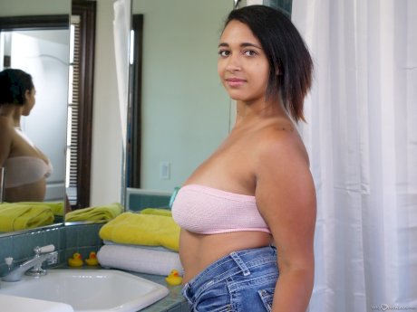 Latina girl with big natural tits  Emori Pleezer blows cock in the bathroom