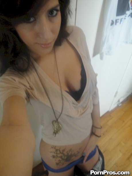 Latina ten April O'Neil whips out her big tits for selfies