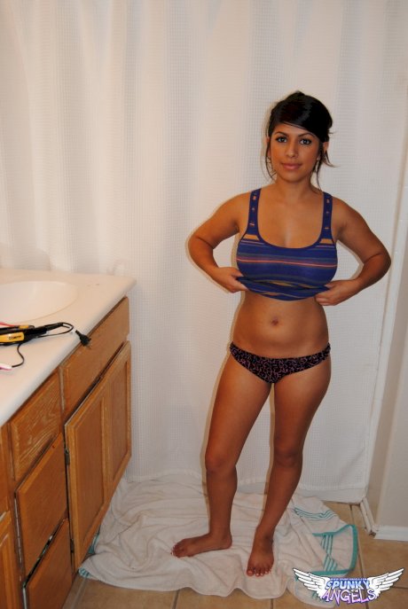 Cute brunette Layla Rose strips to reveal big tits & firm ass in the bathroom
