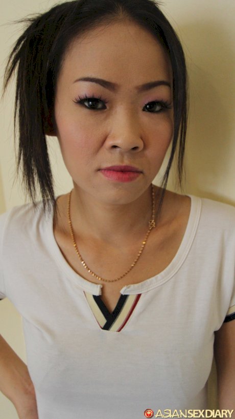 Asian girl with a tramp stamp tattoo fucks a sex tourist POV style