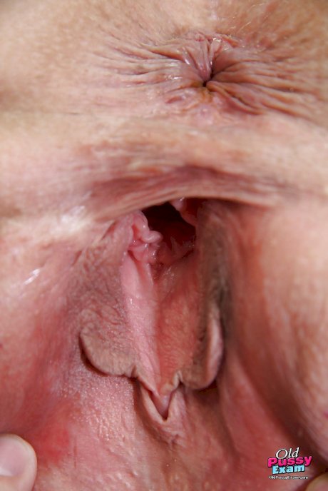 Filthy mature gyno nurse with shaved cunt has no lingerie under her uniform