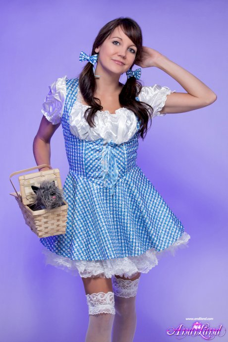 Nice young girl Andi Land looses her tits and pussy from cosplay clothing