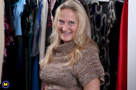 Hot granny in sexy tight dress disrobes to toy her horny snatch in the closet