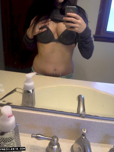 Stacked brunette cutie Freckles 18 takes pictures of her naked body