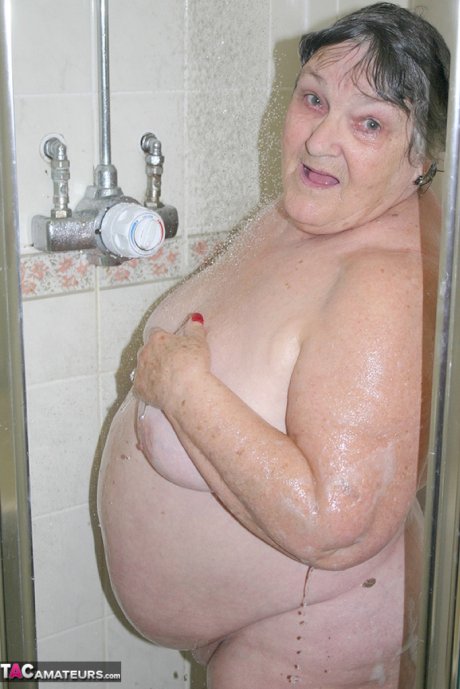 Obese granny Grandma Libby fondles her naked body while taking a shower