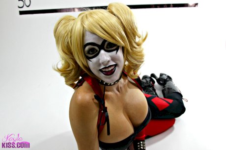 Busty cosplay cutie strips her costume to show her cartoonish proportions