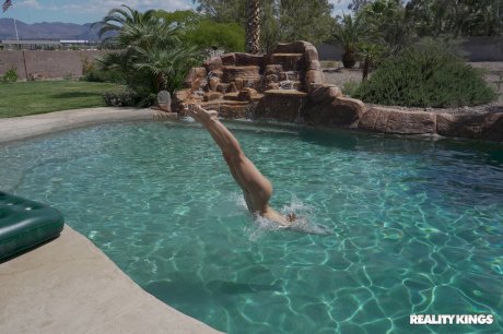 Flexible Abella Danger teases with her big oily booty before fucking poolside