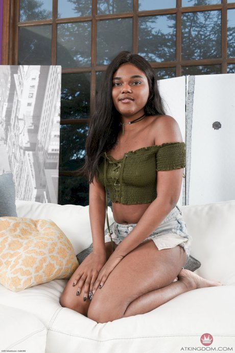 Adorable exotic teen Yara Skye exposes her round ass and nice titties