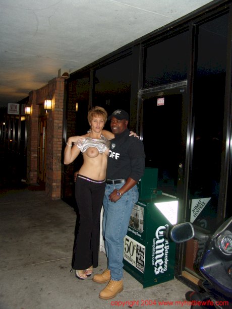 Naughty mature wife Tracy Lick shows off her big tits at a swingers party