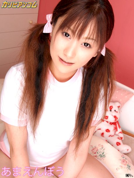 Young Asian broad Miku Haruno gives a sneak peek at her small tits and poses