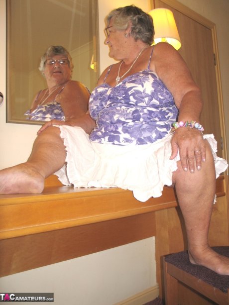 Fat British nan Grandma Libby completely disrobes while in a hotel room