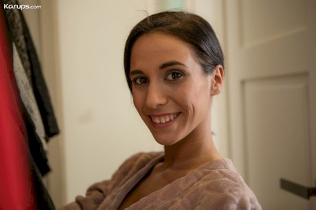First timer Kitty Fox seduces a ripped man in a short robe and black lingerie