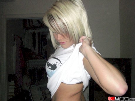 Blonde amateur takes non-nude self shots during solo action