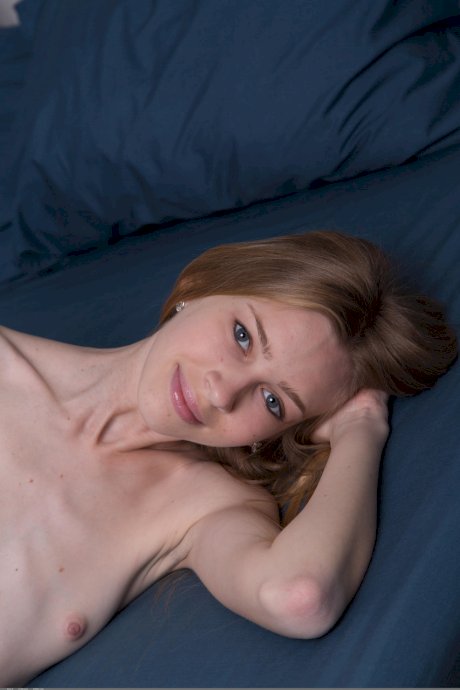 Fabulous teen Rina E exposing her extremely skinny body naked on her bed