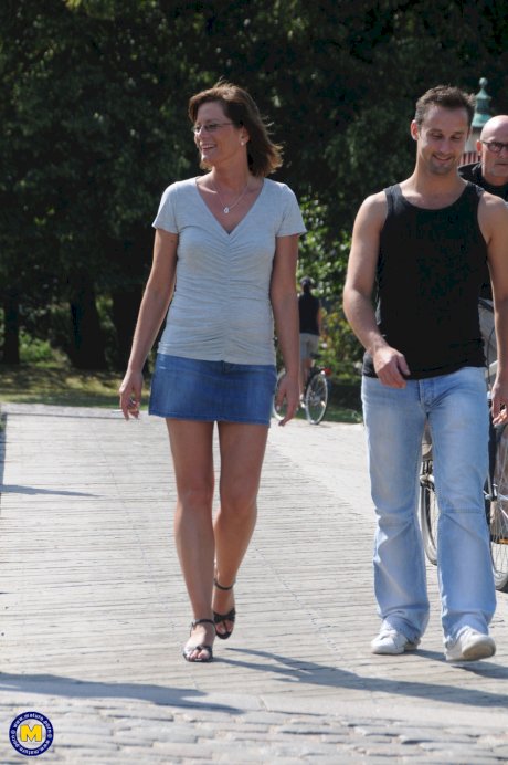 European mature with small tits Lilje gets fucked by two guys in the park