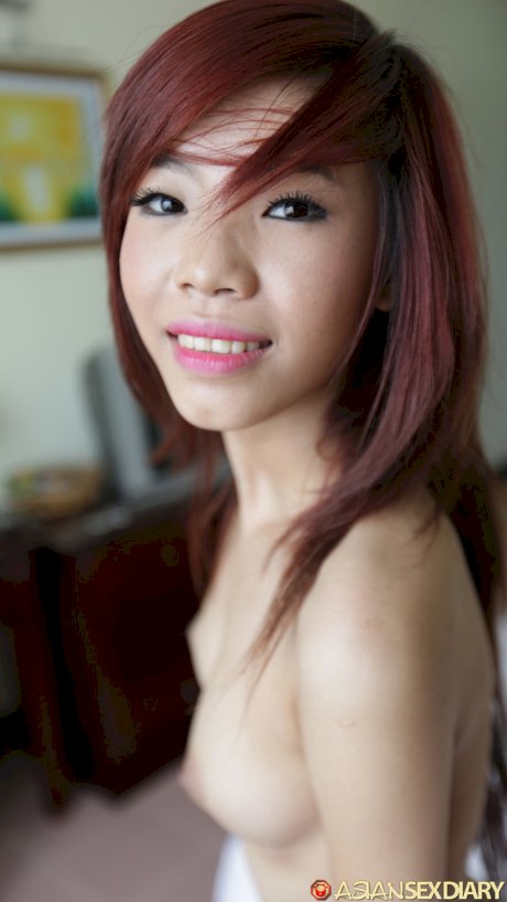 Petite Asian babe Phuong shows her creampied hairy pussy after POV sex