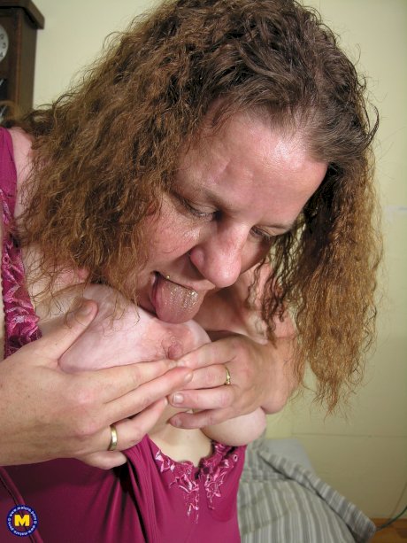 Nasty mature BBW Kirsten licking her pierced nipples and masturbating