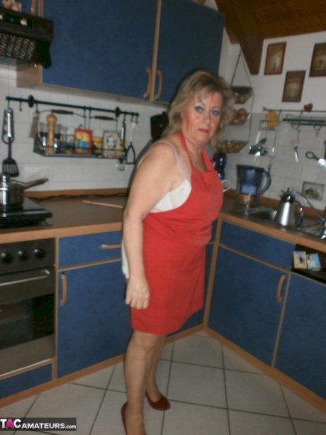 Slutty amateur housewife Caro could not resist masturbating in the kitchen