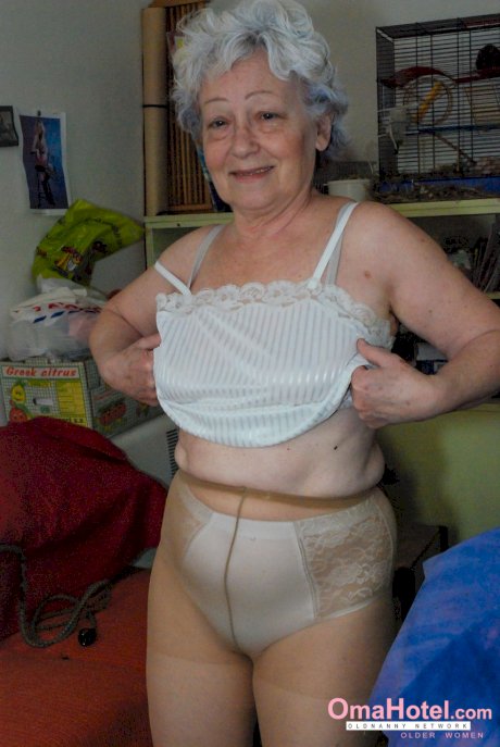 Cock-craving granny Agnes pleasuring her hairy pussy with a dildo