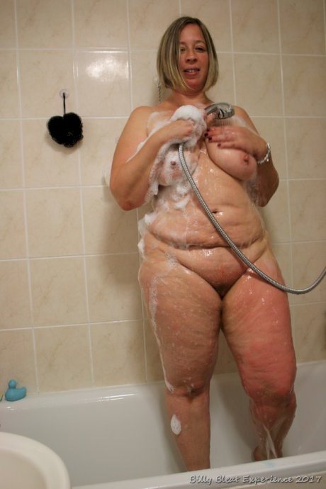 Blonde MILF Shooting Star shows her chubby naked body in the shower