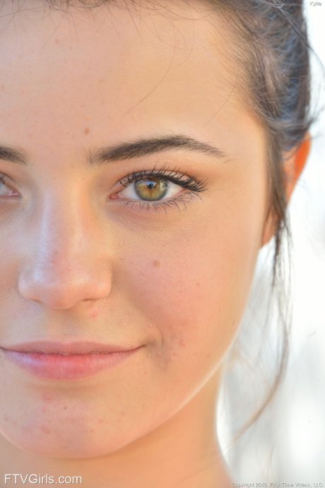 Hot Kylie exposes her body on a volleyball pitch & sticks a veggie in her twat
