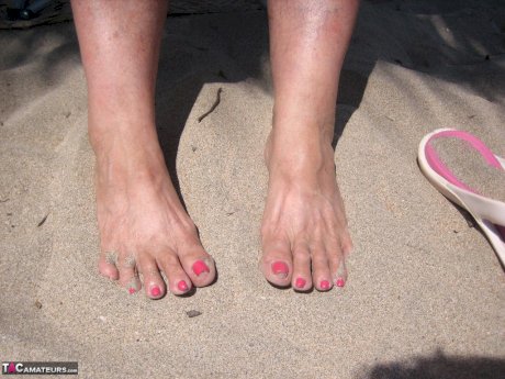 Fat granny Girdle Goddess takes off swimwear to pose nude at the ebach