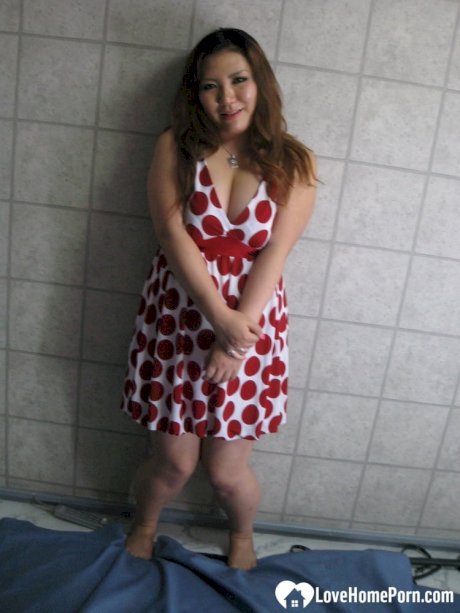 Chubby Asian exposes her huge juggs and massive ass in amateur action