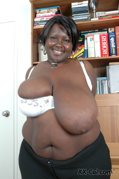 Ebony BBW Mariana Kodjo unleashes her enormous tits and plays with them