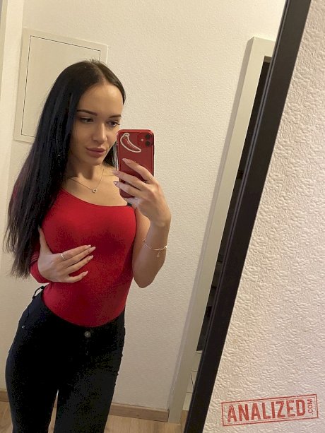Dark-haired amateur Sasha Sparrow takes selfies of her big booty as she strips