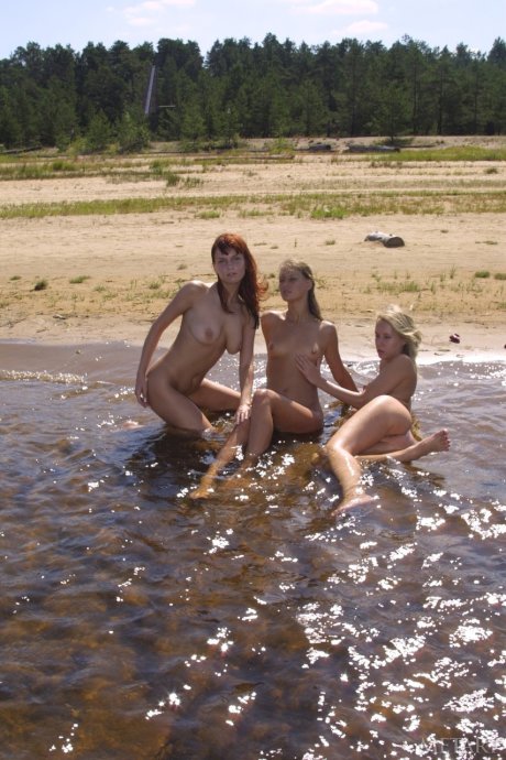 All-natural teenage hotties posing butt naked & playing in the sea water