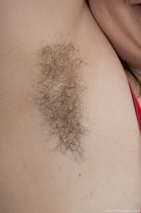 Black haired fatty Esther teases with hairy cameltoe & fingers her furry pussy