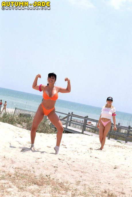 Huge boobed American stunners get wet and naked on the sandy beach