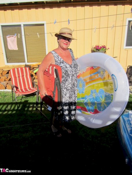 Fatty mature granny Girdle Goddess peels to enjoy wading pool skinny dip