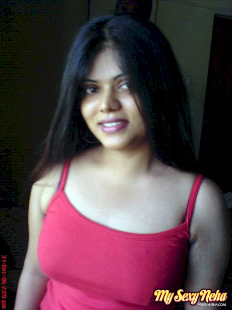 Indian chick Neha uncovers her natural tits during solo action